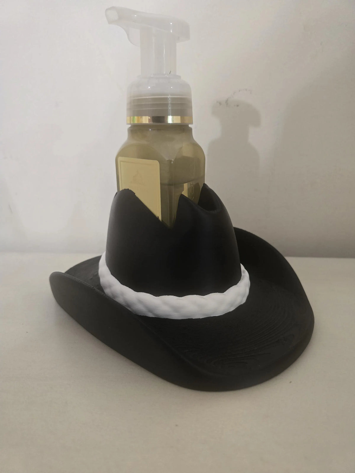 Black cowboy hat soap dispenser holder