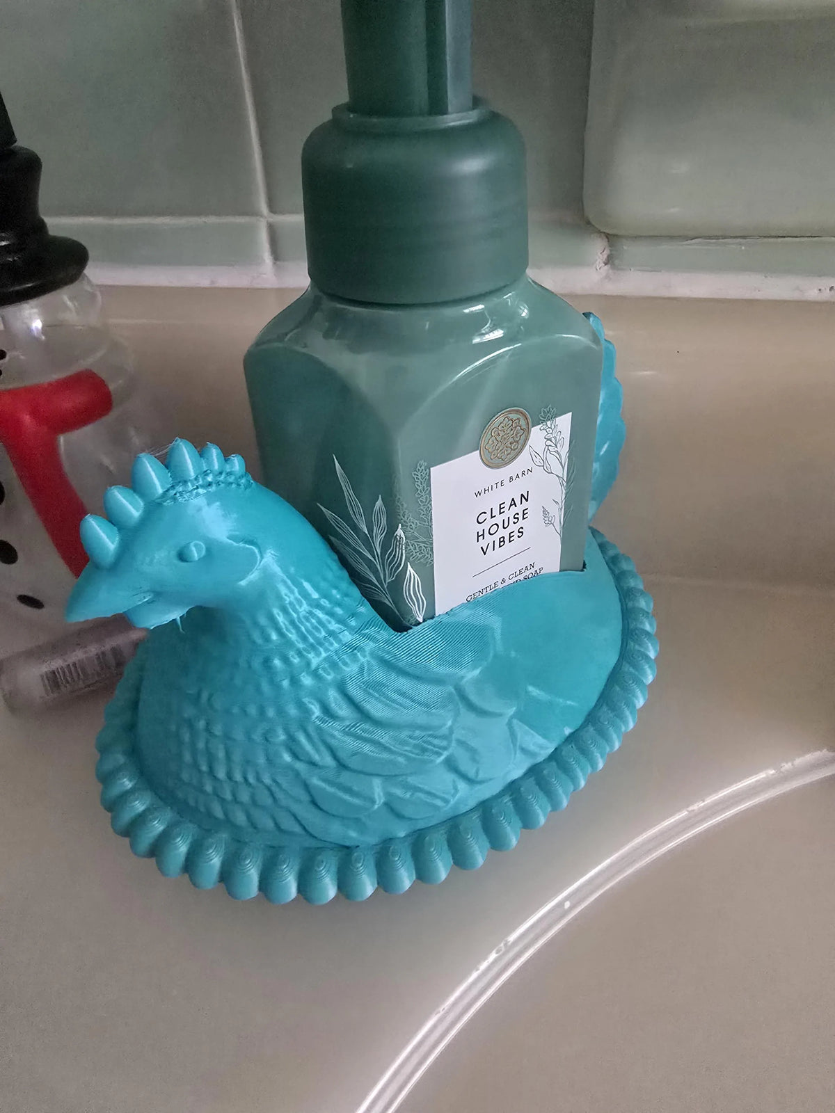 Lagoon blue chicken soap holder with soap bottle
