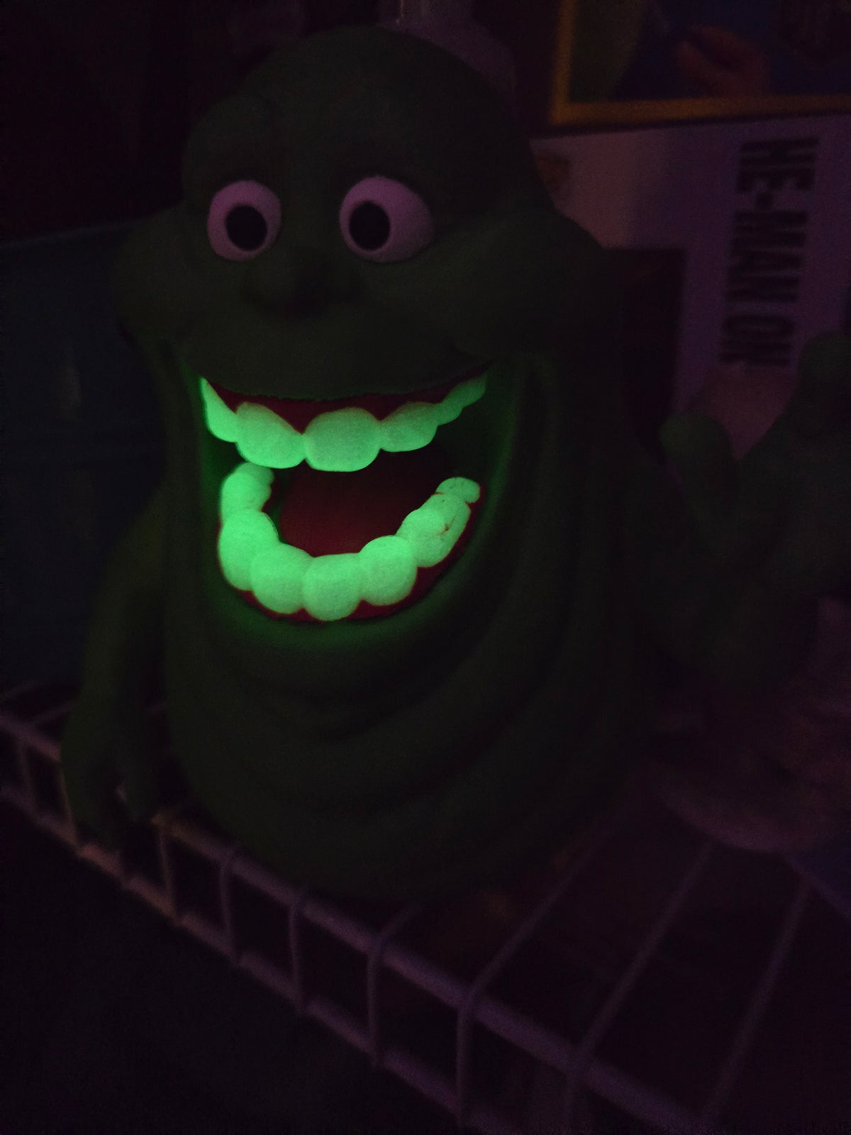 Green ghost soap holder on a bathroom counter