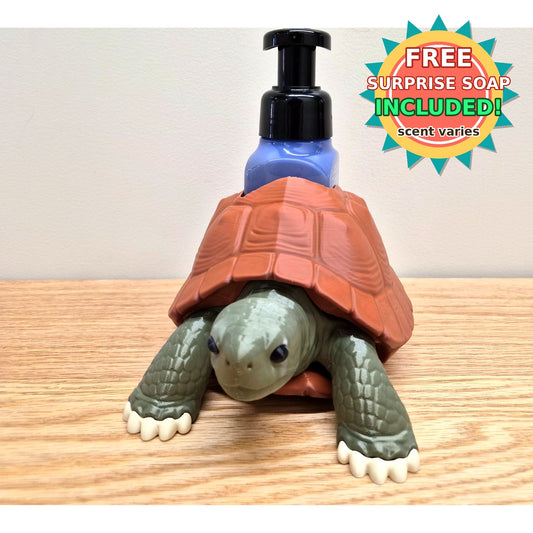Front view of tortoise soap dispenser holder, free surprise soap badge