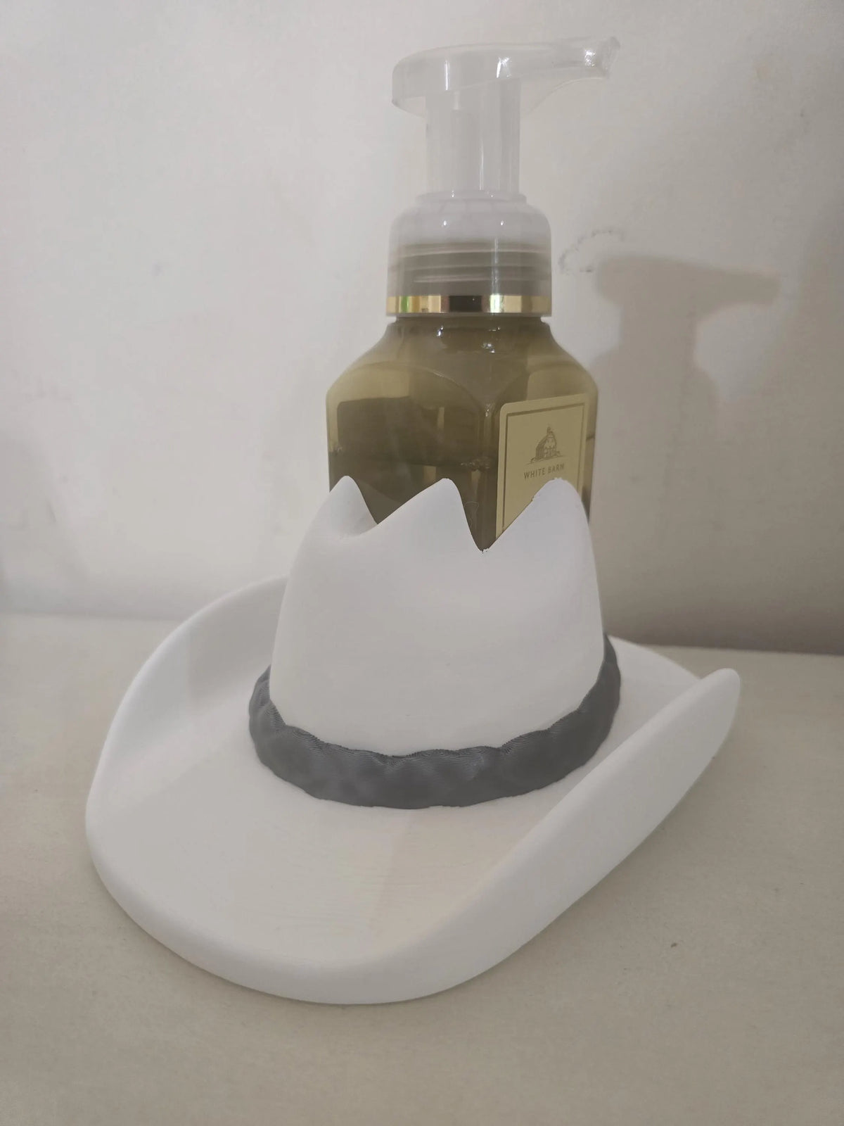 White cowboy hat soap dispenser holder