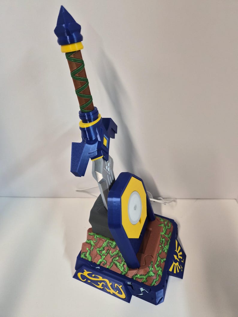 Sword removed from pedestal showing hilt wrap and blade finish