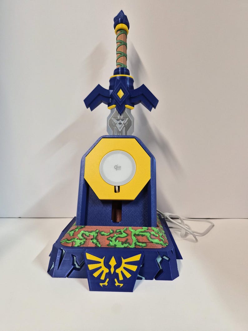 Close view of the sword blade and hilt set into the pedestal base