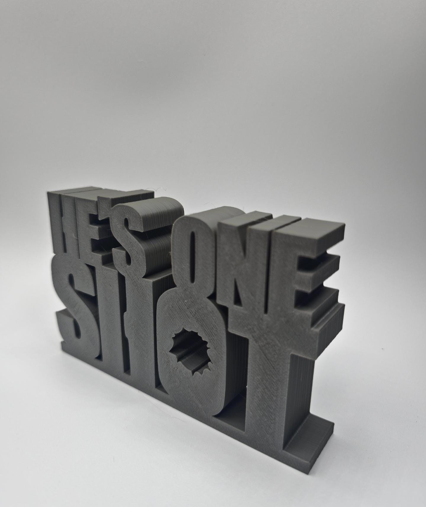 Sign displayed on a desk