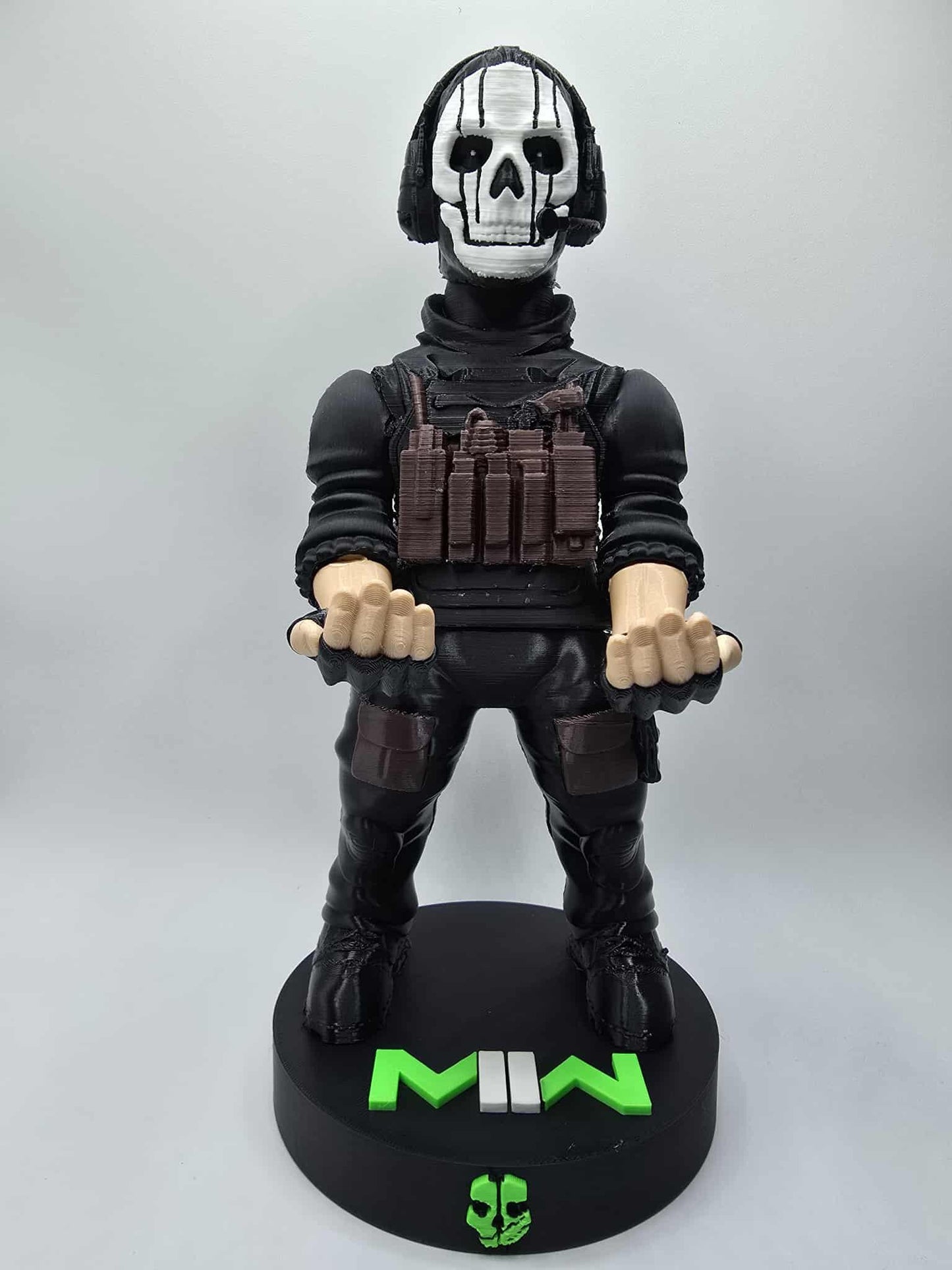 Tactical controller stand holding a controller