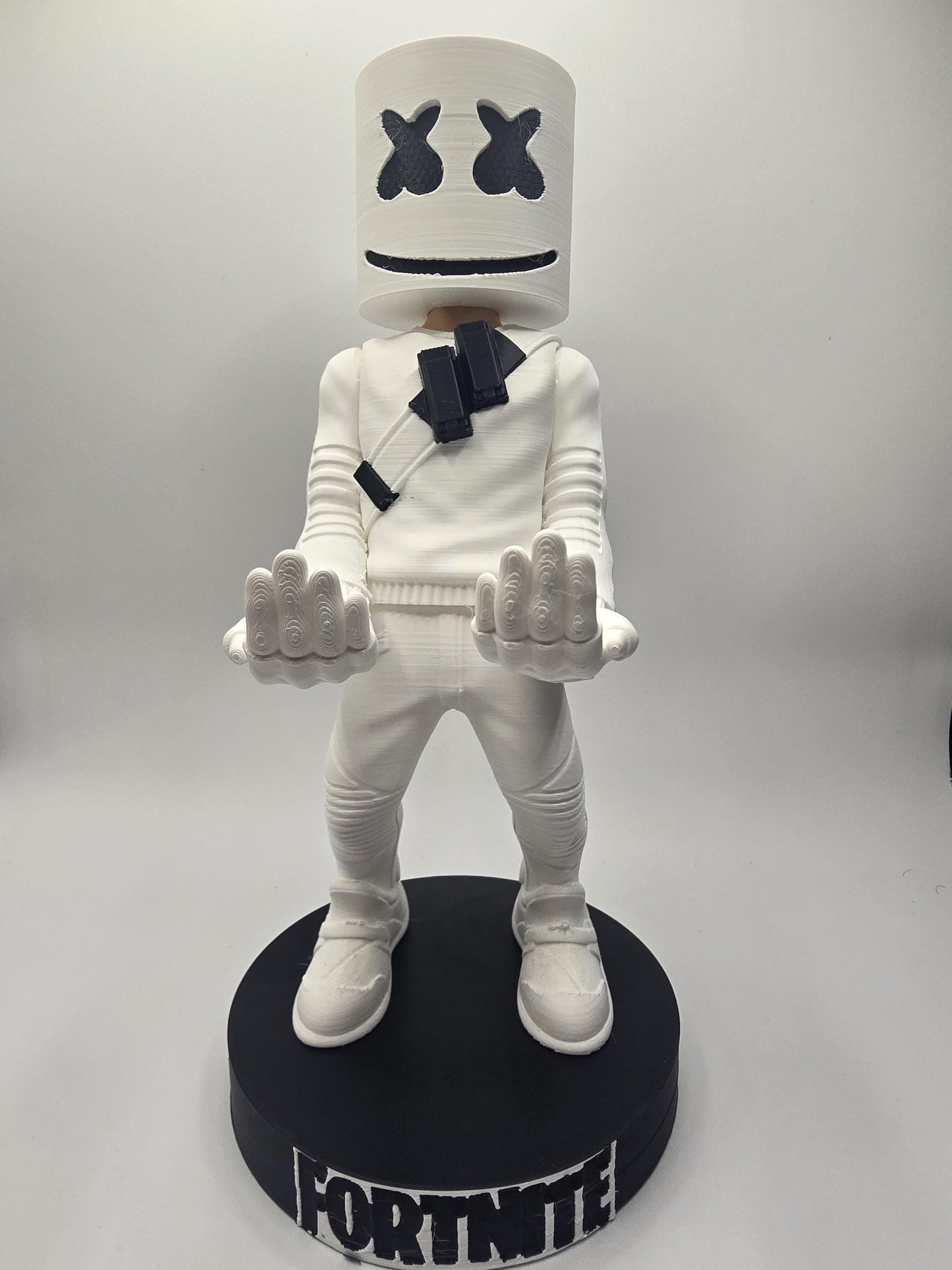 Marshmallow controller stand holding a controller