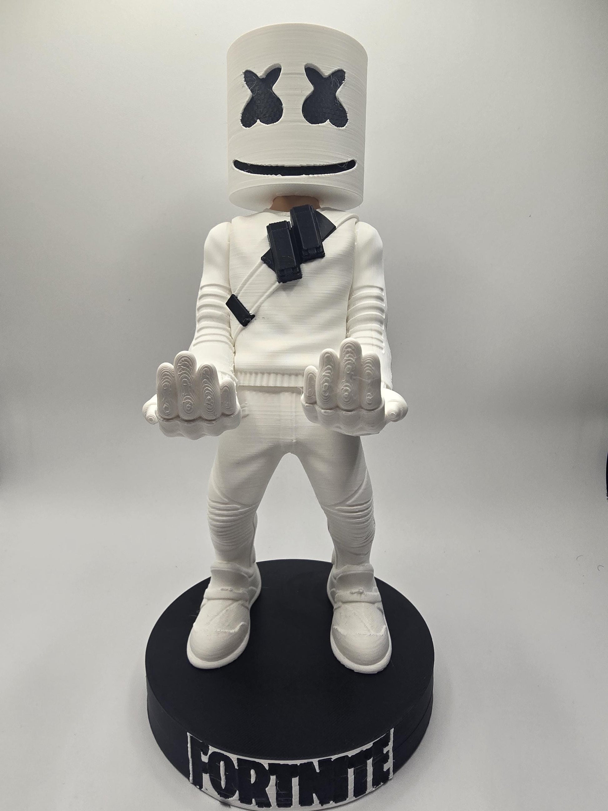 Marshmallow controller stand holding a controller